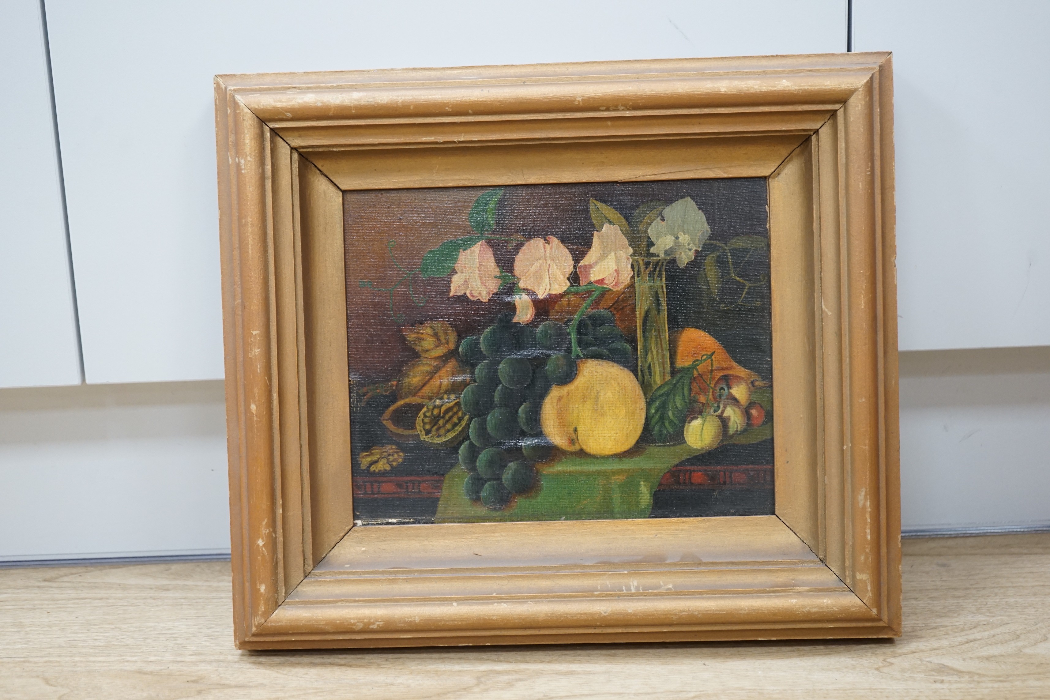 English School c.1900, oil on canvas laid on board, Fruit and sweet peas on a table top, 21 x 26cm